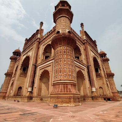 A striking view of Safdarjung's Tomb showcasing its intricate Mughal architecture under a clear sky.